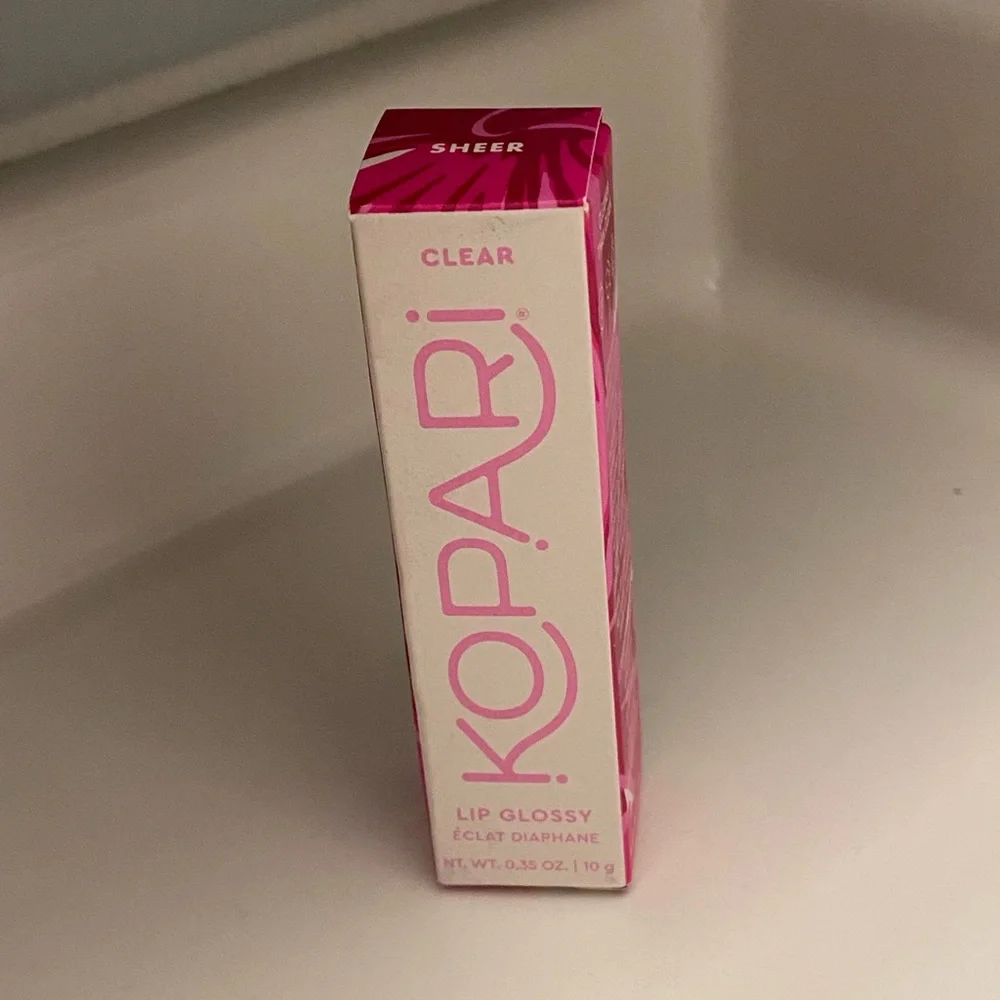NWT KOPARI MOISTURIZING LIP GLOSSY WITH SHEA BUTTER AND COCONUT OIL
